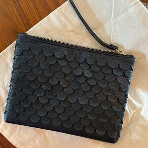 Black textured clutch